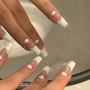 French white nail art with premium craftsmanship by Le Romey.