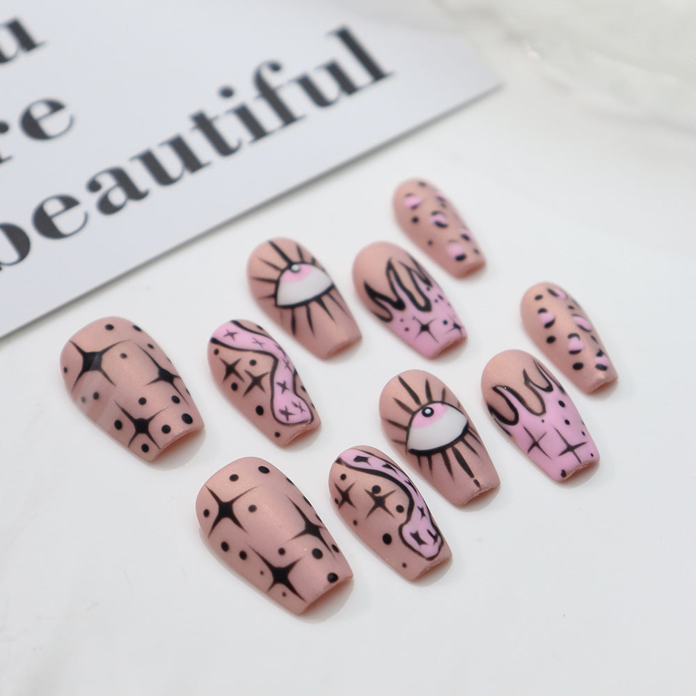 Pink graffiti press-on nails with leopard print and artistic details