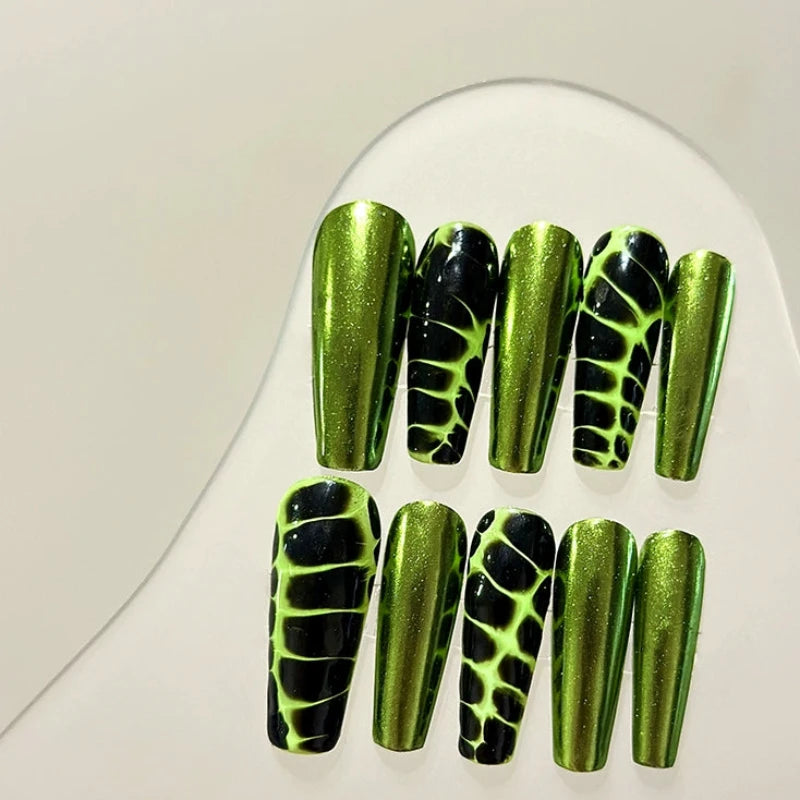 Long coffin nails showcasing a vibrant green python design.