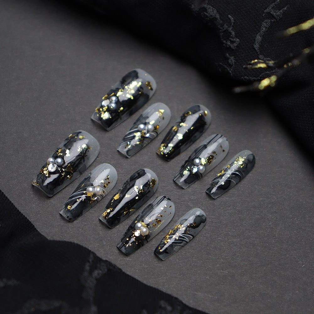 Black gold coffin nails with hand-painted bamboo design.