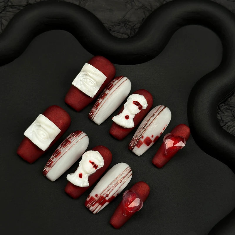 othic-style coffin nails with 3D David sculpture accents.