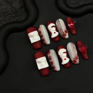 3D David plaster nails in matte red and white tones.